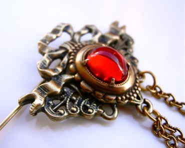Broche dorée en verre ambré vintage des années 1980